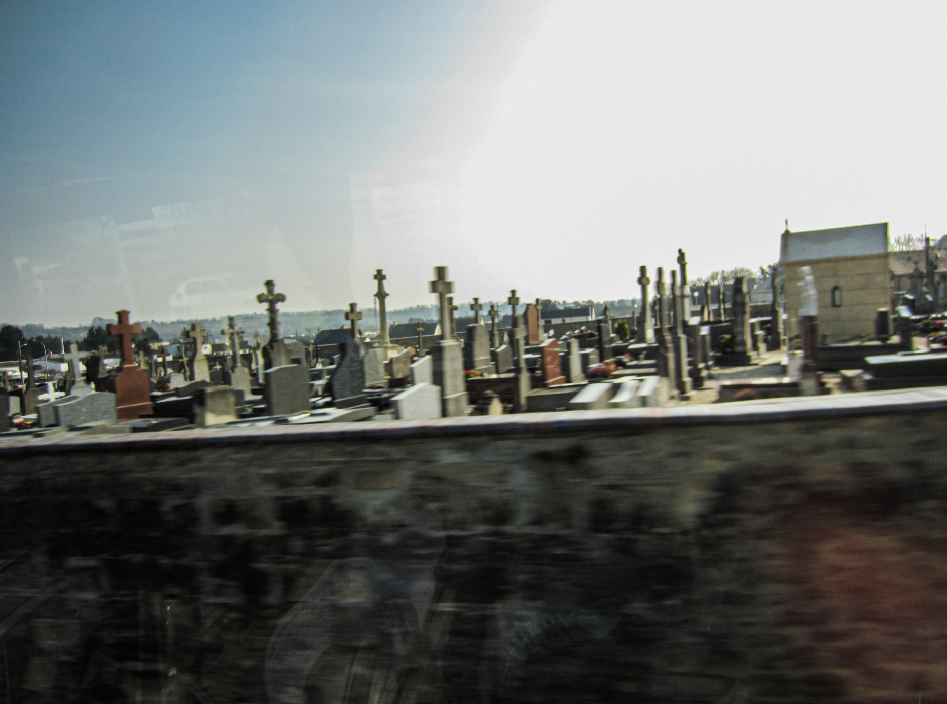 French graveyard with bright sky