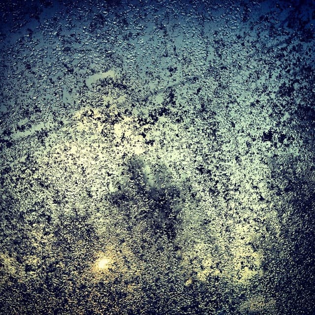 Frosty ice pattern on car window